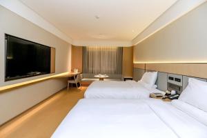 TV/trung tâm giải trí tại JI Hotel Chongqing Wanzhou Wanda Plaza +25 ảnh