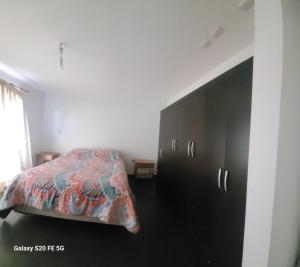 Ένα ή περισσότερα κρεβάτια σε δωμάτιο στο CABAÑAS SALTOS DEL LAJA Duende Lientur