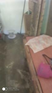 a room with a counter and a table with a table at Mike Saba 