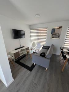 تلفاز و/أو أجهزة ترفيهية في Casa Playa el Tabo en Condominio Estilo Mediterraneo