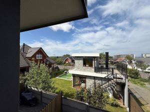 a view of a house from a balcony at Wifi, Parking, AC, Bien equipado, 5 min del centro y todo cerca in Osorno