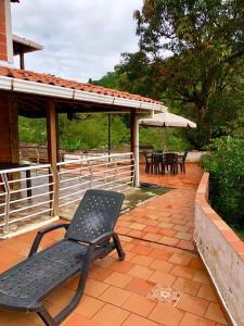 En balkon eller terrasse på Cabaña campestre