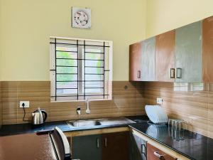 Køkken eller tekøkken på Anandha Vibes