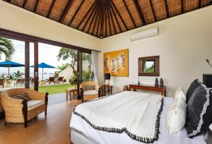 Ένα ή περισσότερα κρεβάτια σε δωμάτιο στο Villa Aamisha