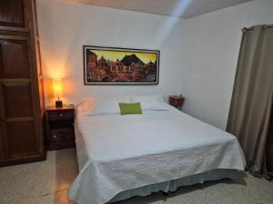 Ένα ή περισσότερα κρεβάτια σε δωμάτιο στο Bedroom for 4 in Antigua Guatemala