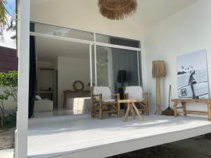 TV a/nebo společenská místnost v ubytování Sama Beach Resort by Munchies Resort