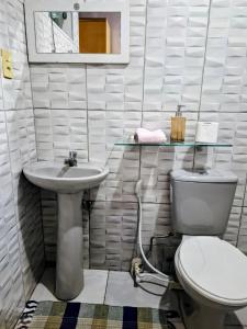 Ванная комната в Cantinho da Rainha Aparecida do Norte