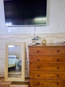 Телевизор и/или развлекательный центр в Cantinho da Rainha Aparecida do Norte