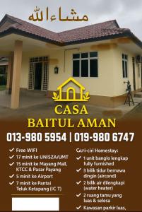 a flyer for aaa bathroom aman in front of a house at Casa Baitul Aman in Kuala Terengganu
