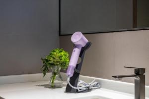 Imagine din galeria proprietății GLaDoRe Shenzhen Hotel în Shutianbu