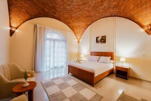 Ένα ή περισσότερα κρεβάτια σε δωμάτιο στο opal legacy luxor