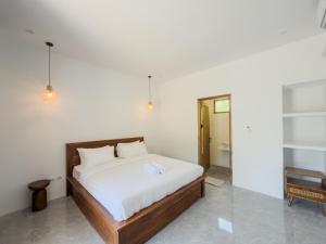 Postel nebo postele na pokoji v ubytování Luz Tropical Homestay