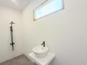 Koupelna v ubytování Luz Tropical Homestay