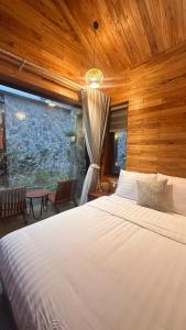 Ένα ή περισσότερα κρεβάτια σε δωμάτιο στο Avana House +61 φωτογραφίες