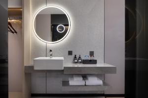 Ένα μπάνιο στο OKDAY Hotel Hengyang Nanhua University Jiefang Xi Road