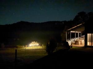 a night view of a field with a barn at Laguna Valley Country Retreat in Laguna