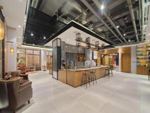 Χώρος καθιστικού στο James Joyce Coffetel Tianjin Railway Station
