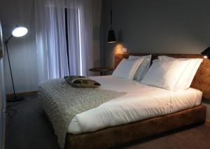 Cama ou camas em um quarto em XPT Águeda - Alojamento Local