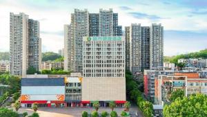 a view of a city with tall buildings at City Comfort Inn Hotel Zigong Wanda Plaza in Shuping