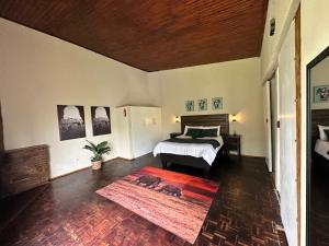 Ένα ή περισσότερα κρεβάτια σε δωμάτιο στο Palm View