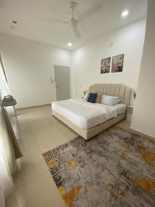 Postel nebo postele na pokoji v ubytování NR Homestay in Kluang + 21 fotografií