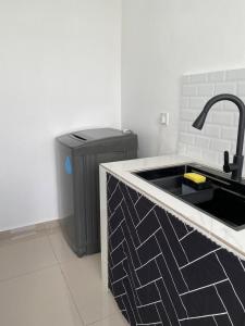 Kuchyň nebo kuchyňský kout v ubytování NR Homestay in Kluang