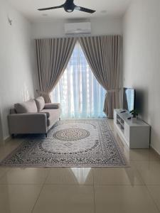 TV a/nebo společenská místnost v ubytování NR Homestay in Kluang