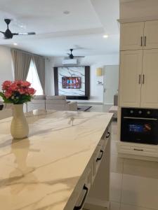 Kuchyň nebo kuchyňský kout v ubytování NR Homestay in Kluang