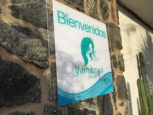 Certifikát, hodnocení, plakát nebo jiný dokument vystavený v ubytování Yemanya Hostal