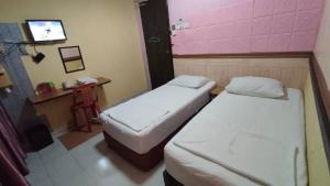 Ένα ή περισσότερα κρεβάτια σε δωμάτιο στο hotel hen hen +10 φωτογραφίες