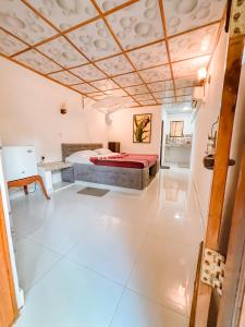 Ένα ή περισσότερα κρεβάτια σε δωμάτιο στο Anu Villa Wadduwa