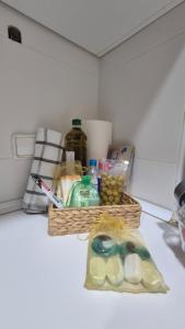 a basket of food sitting on top of a counter at Amplio Adosado 160 m, jardín privado barbacoa, vistas al mar, wifi 7 px mascotas in Peñíscola