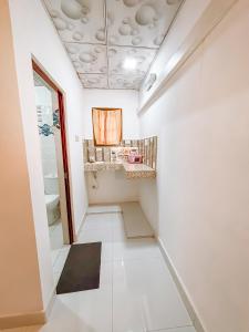 Ένα ή περισσότερα κρεβάτια σε δωμάτιο στο Anu Villa Wadduwa