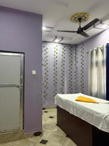 Ένα ή περισσότερα κρεβάτια σε δωμάτιο στο Hotel De Bramha