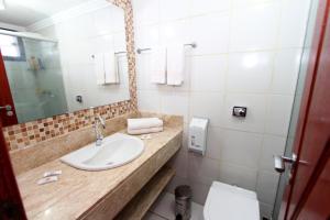 Um banheiro em Hotel Casa Blanca Porto Seguro