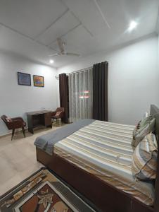 Кровать или кровати в номере Quiet Haven