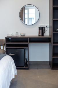 Giường trong phòng chung tại Seabreeze by Matteo