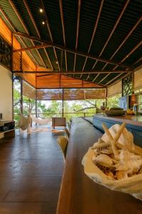 a table with french fries on top of it at Villa Luzo & Tours in Saonek