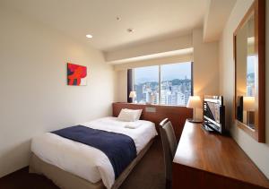 TV a/nebo společenská místnost v ubytování Oriental Hotel Hiroshima