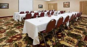 a large conference room with a long table and chairs at Holiday Inn Express Munising-Lakeview Hotel By IHG in Munising