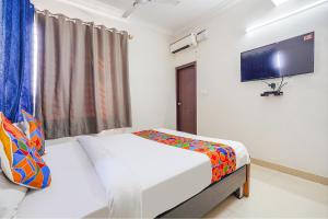 Μια τηλεόραση ή/και κέντρο ψυχαγωγίας στο FabHotel Emirates Inn