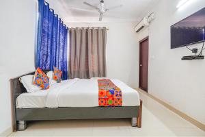 Ένα ή περισσότερα κρεβάτια σε δωμάτιο στο FabHotel Emirates Inn +21 φωτογραφίες