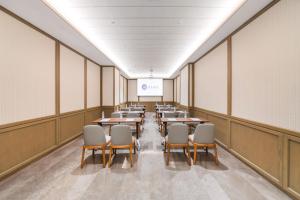 Un restaurante u otro lugar para comer en Manxin Hotel, Guilin Road, Changchun Zoo and Botanical Garden