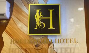 a hotel sign on the wall of a store at Hollywood Hotel Palawan in Puerto Princesa City