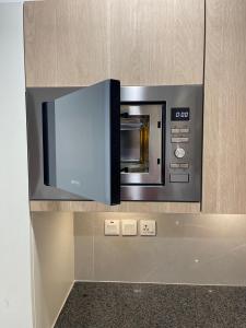 Φωτογραφία από το άλμπουμ του Sapphire 1BHK Studio DHA 5 Lahore, Near Raya, Dolmen Mall στη Λαχόρη +24 φωτογραφίες