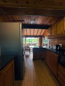 Kuchyň nebo kuchyňský kout v ubytování Imvubu Lodge