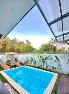 Bazén v ubytování The Hide El Nido Villas nebo v jeho okolí + 15 fotografií