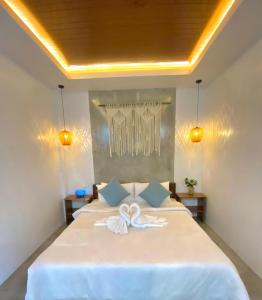 Postel nebo postele na pokoji v ubytování The Hide El Nido Villas