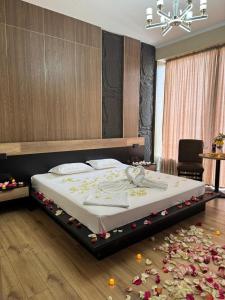 Ένα ή περισσότερα κρεβάτια σε δωμάτιο στο Van park hotel