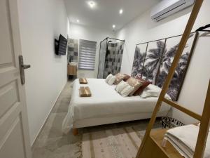 Кровать или кровати в номере O Portes des HALLES 2